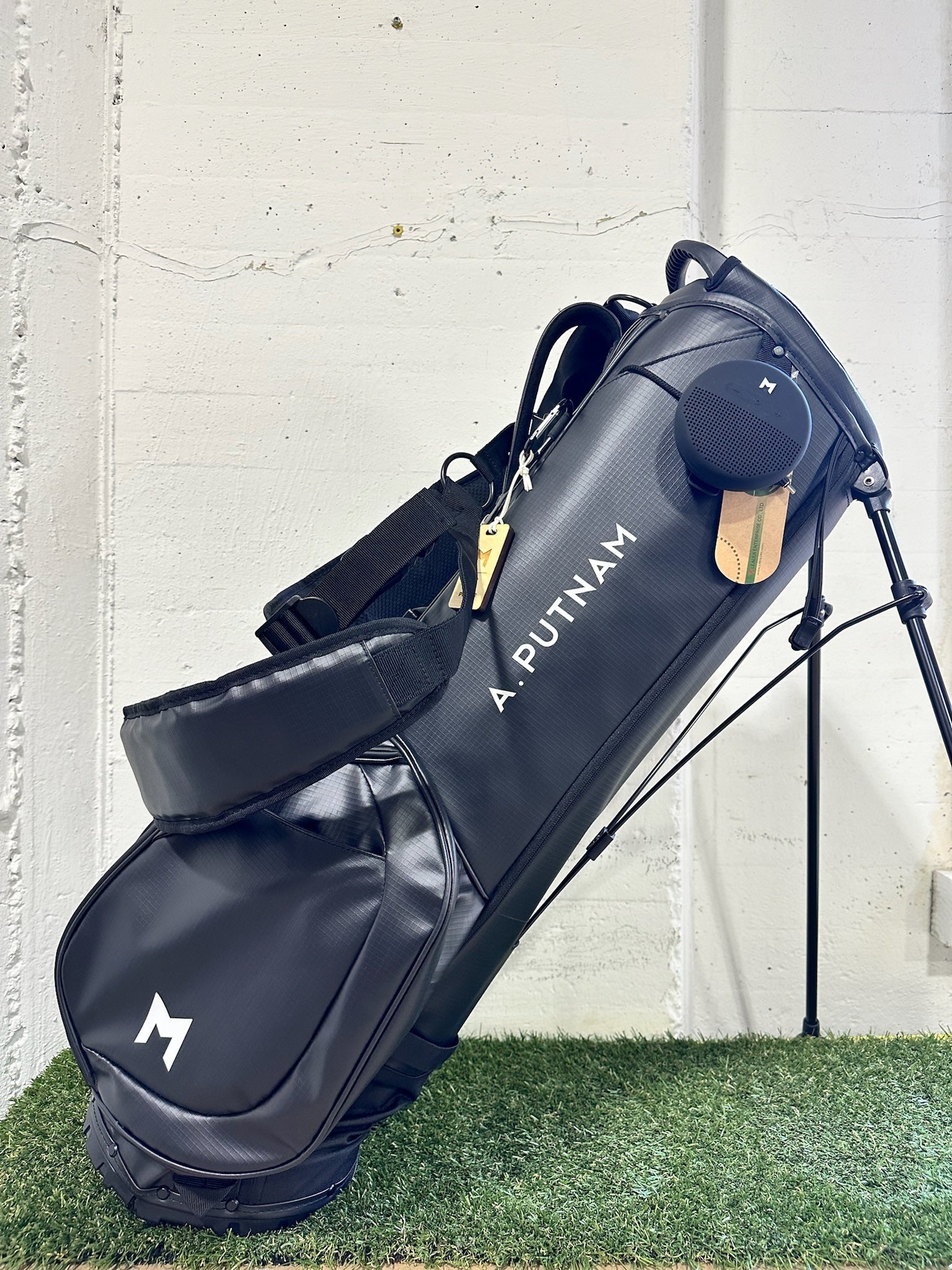 A. Putnam hand painted on the black MR1 eco friendly golf bag, by MNML GOLF. 