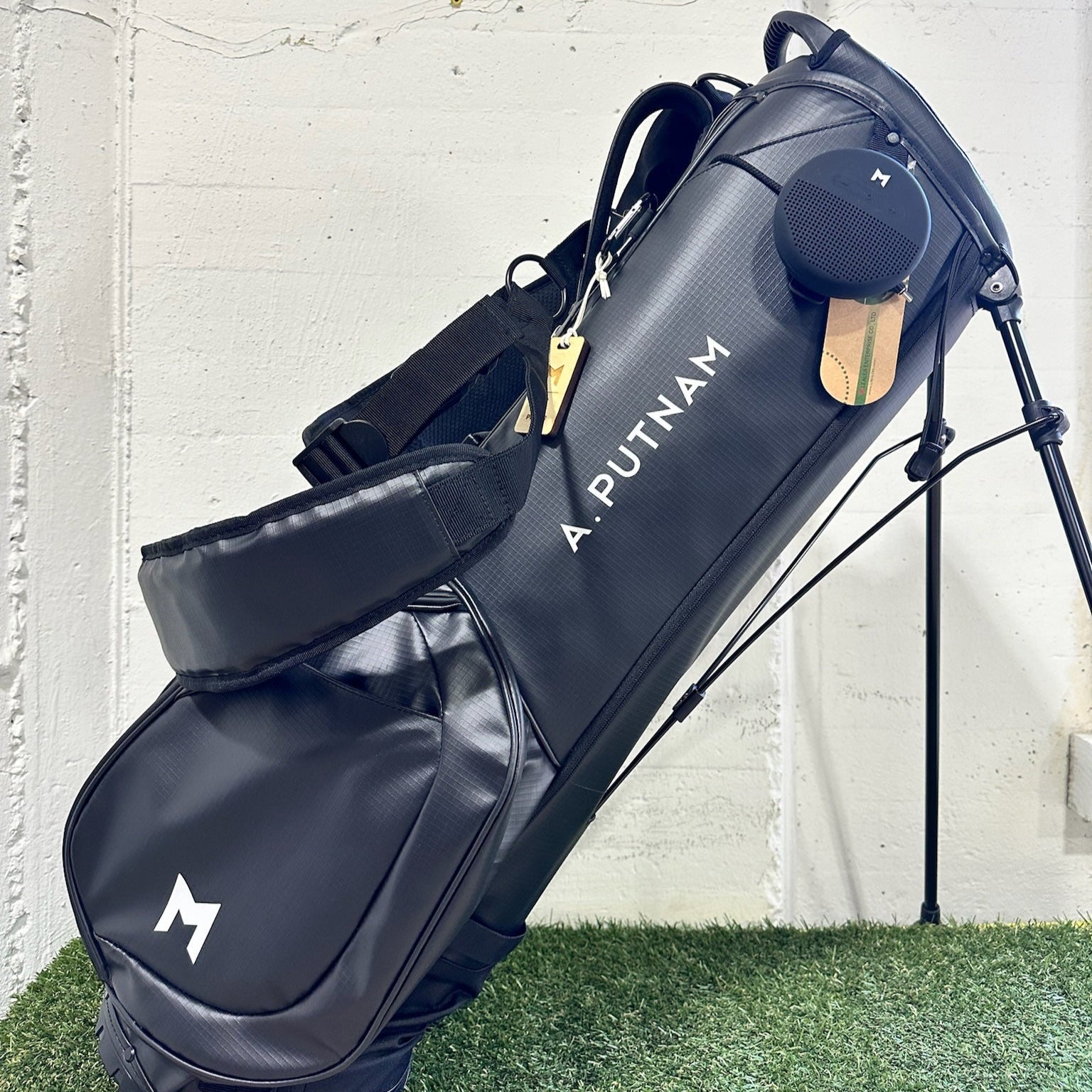 A. Putnam hand painted on the black MR1 eco friendly golf bag, by MNML GOLF.
