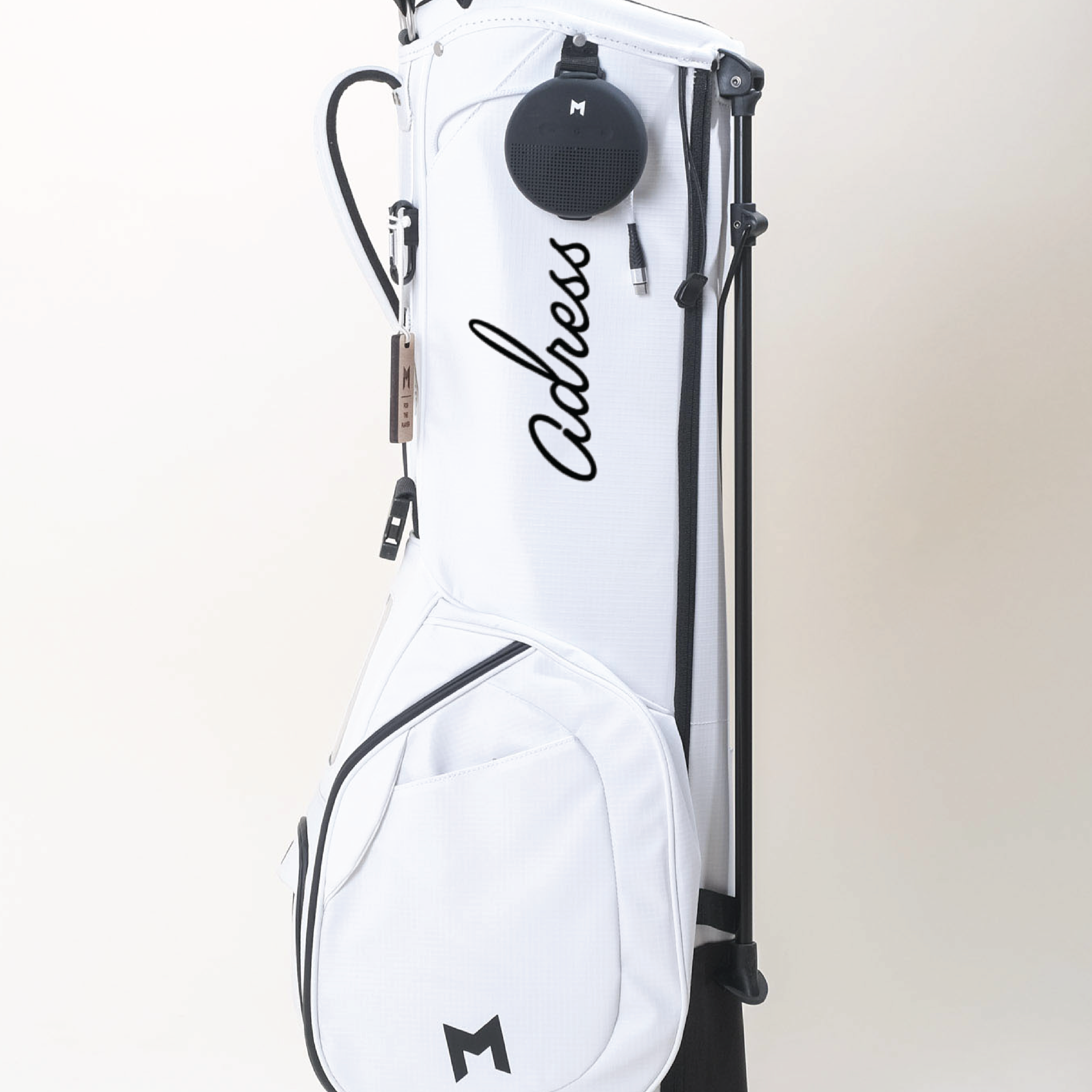 MNML GOLF collaborated with Adress golf company. The white MR1 features the Adress golf logo in contrasting black paint on bright white  recycled ripstop.