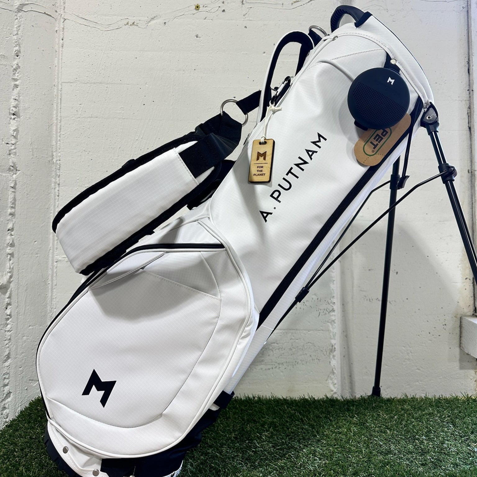A. Putnam hand painted on the white MR1 sustainable golf bag.