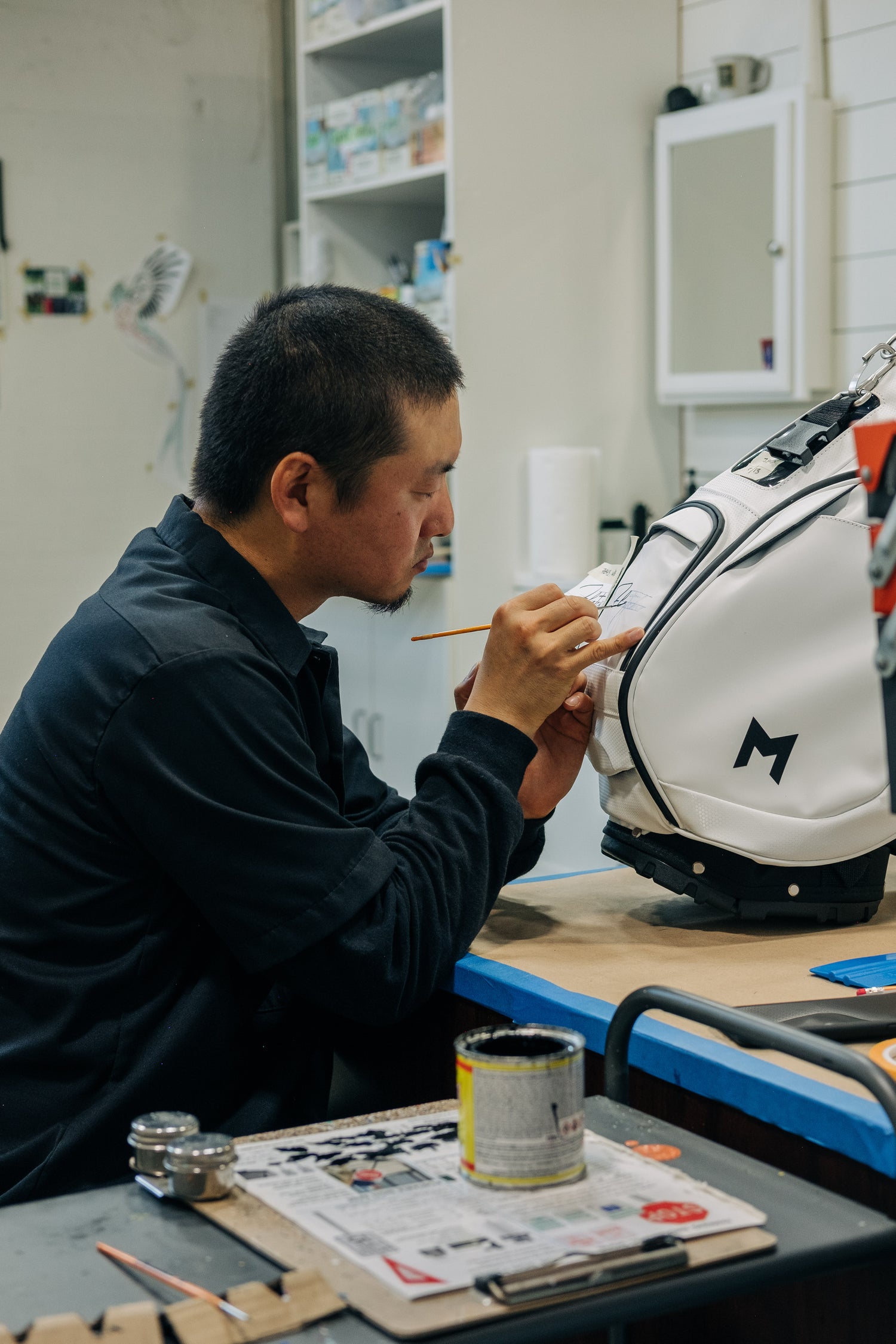 mnml golf offers golf bag customization, with hand painted artwork by certified artist.