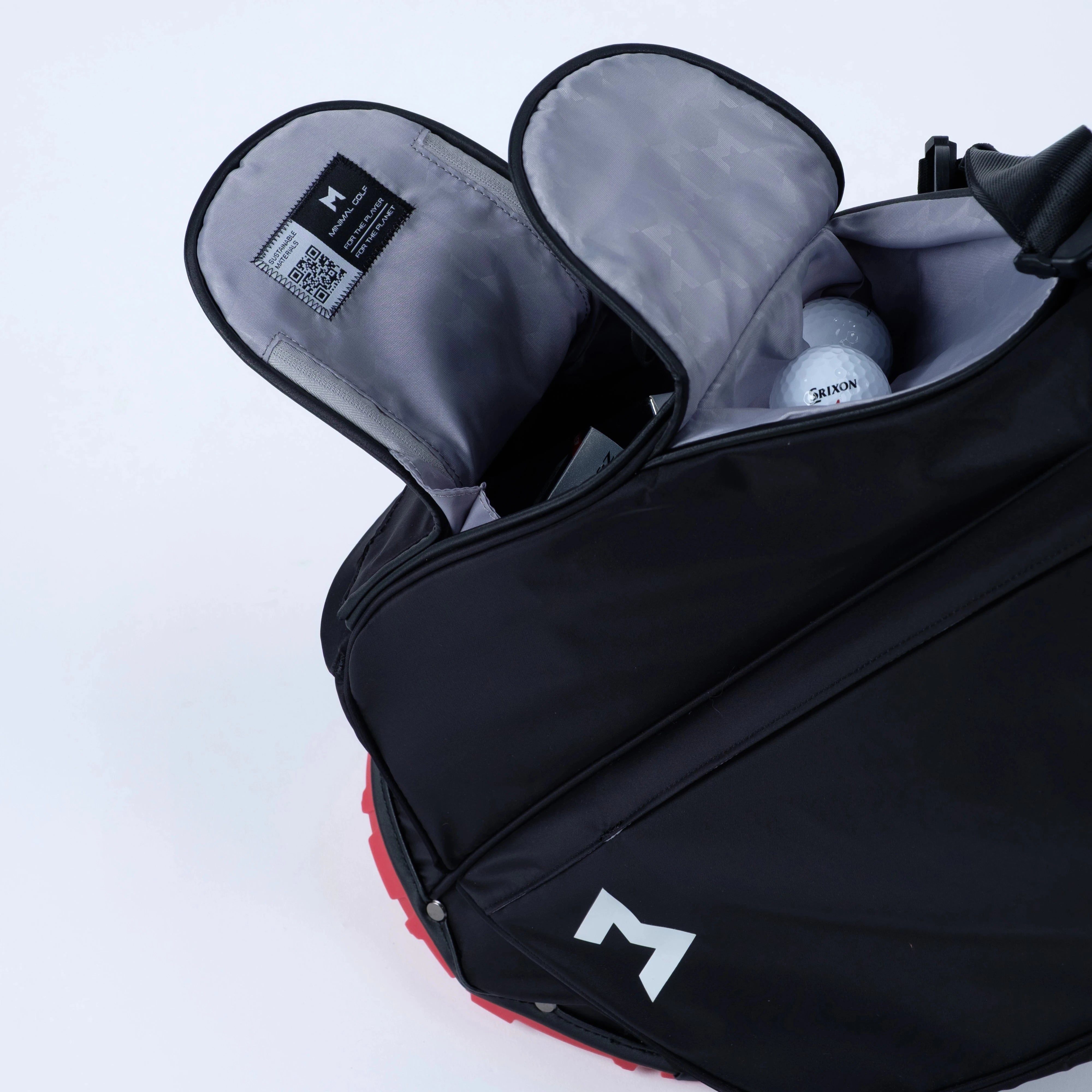 Black bag with a visible brand logo on a light gray background