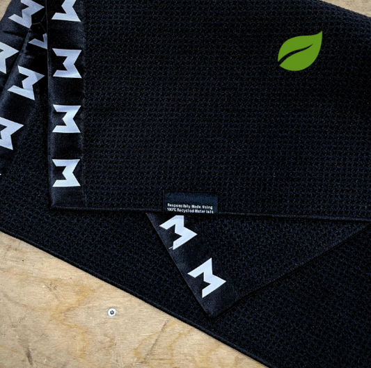 This is the MNML GOLF Eco Towel made better for the planet and the modern golfer.