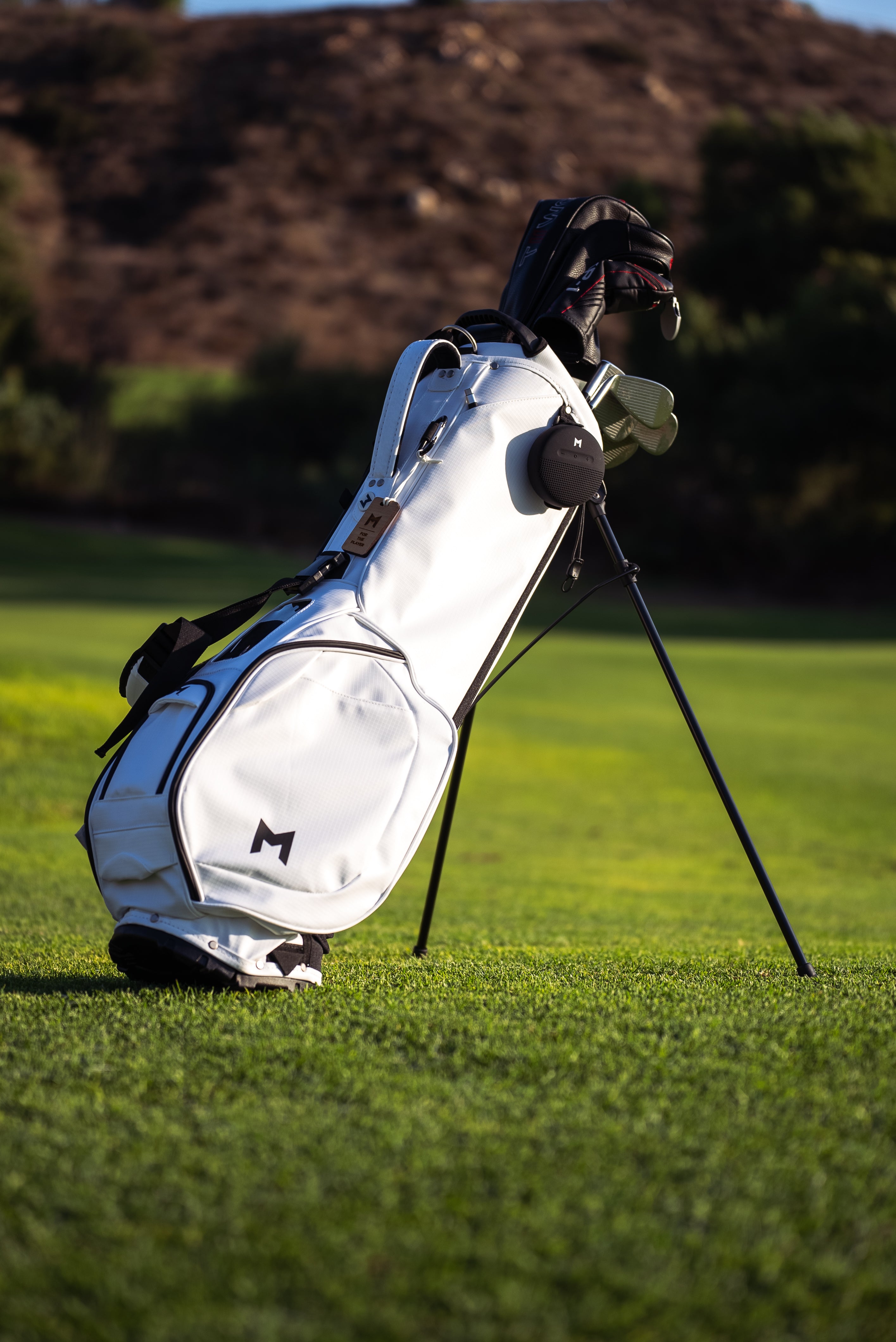 Add on MNML GOLF's waterproof bluetooth speaker, that attaches easily to the new MR1 sustainable golf bag.