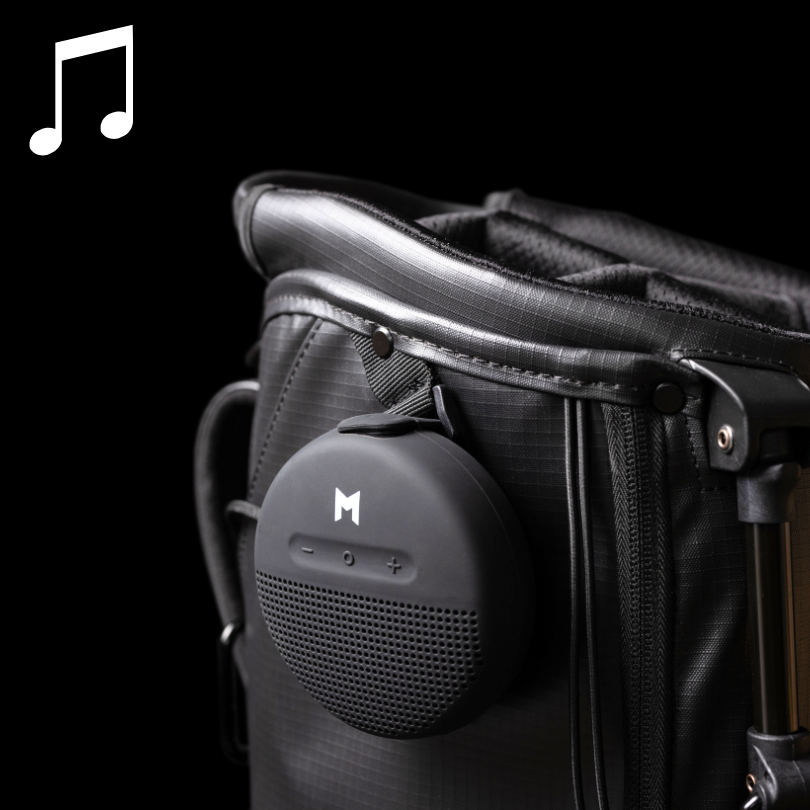 Add the MNML GOLF waterproof bluetooth speaker to your MNML GOLF MR1 sustainable golf bag . This speaker has an 8 hour battery life and allows you to keep your music close while on the range or playing 18 with friends.