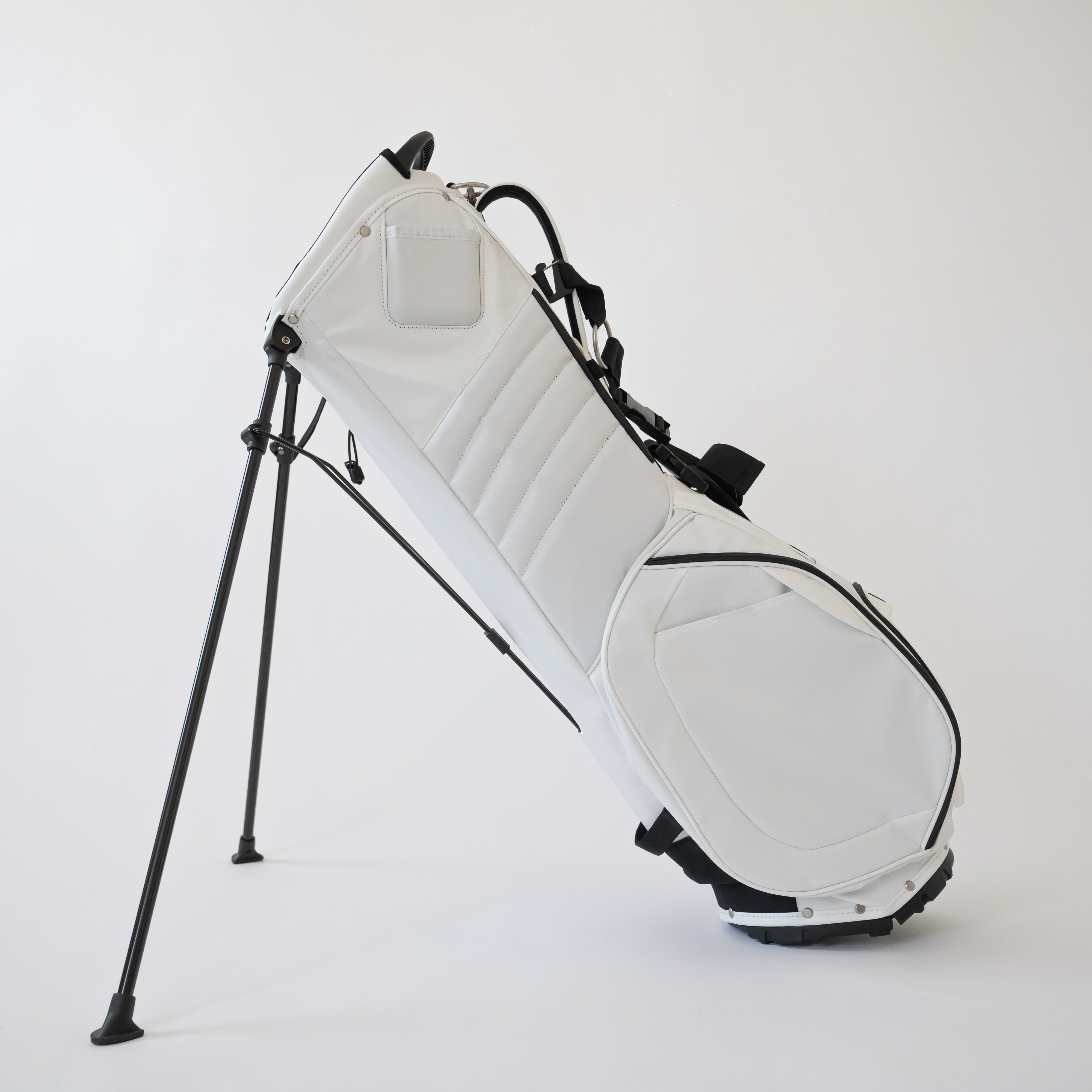 A black golf stand bag with the M brand logo on the side, set against a white background.