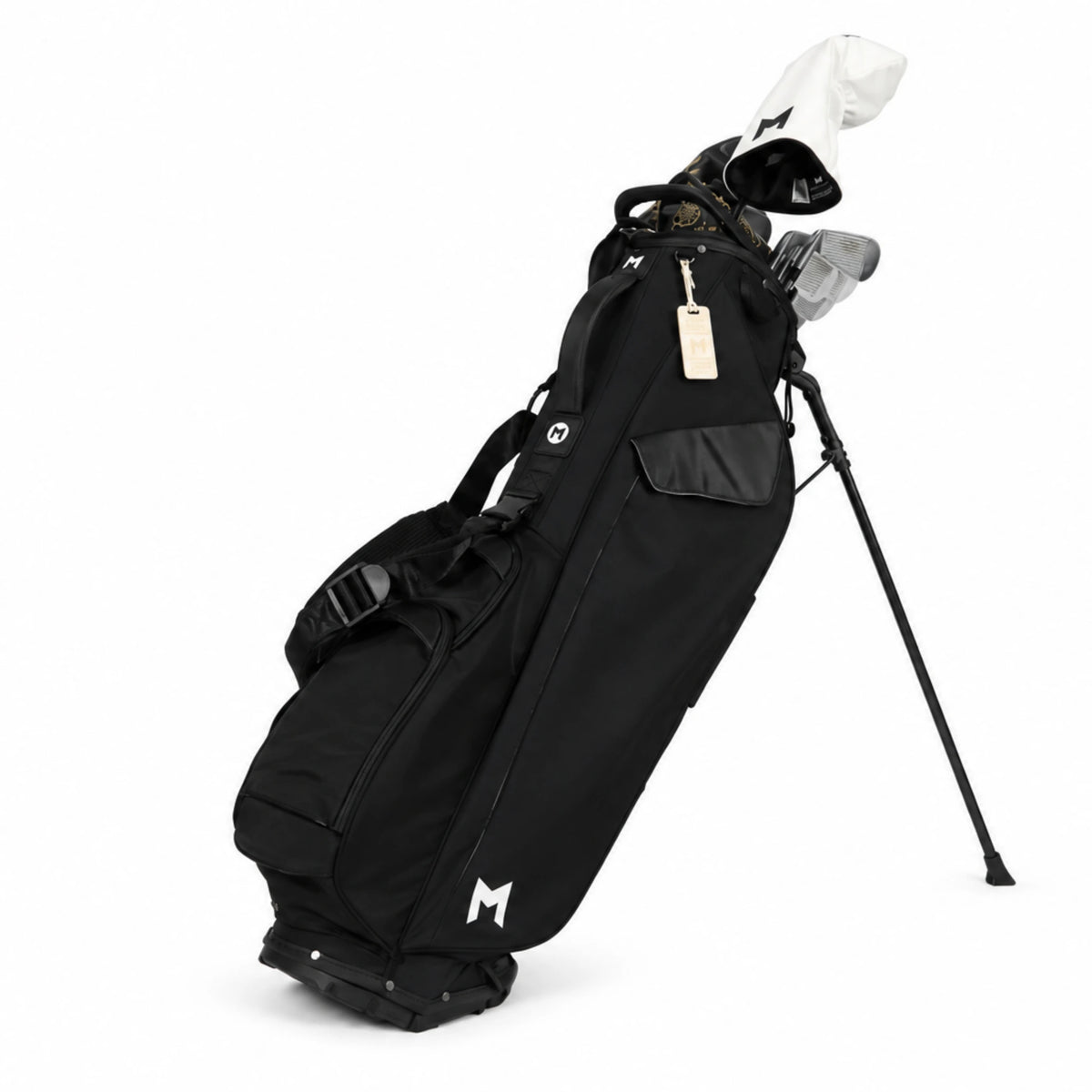 A black stand golf bag with a telescoping stand leg extended, holding golf clubs, photographed on a clean white background.