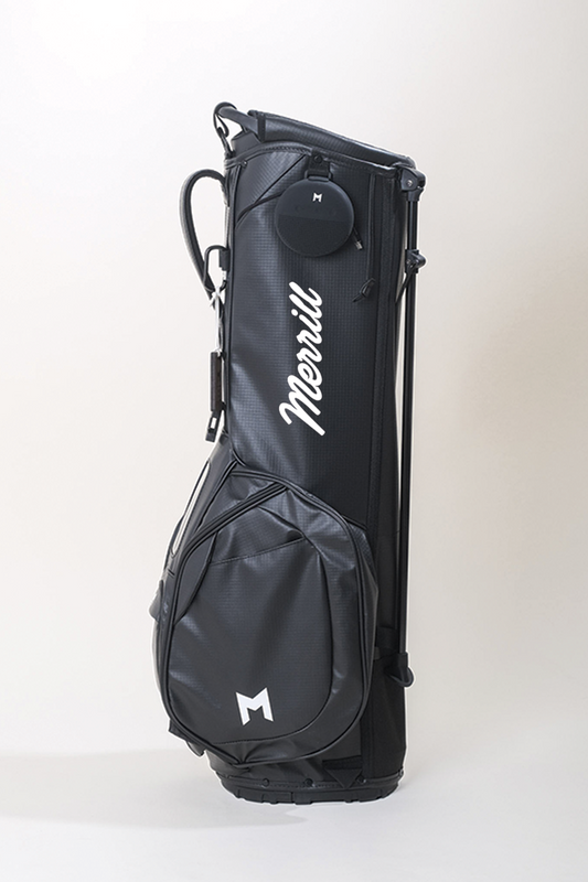 In collaboration with Merrill Golf, MNML GOLF designed a hand painted, black golf bag with contrasting white logo paint.