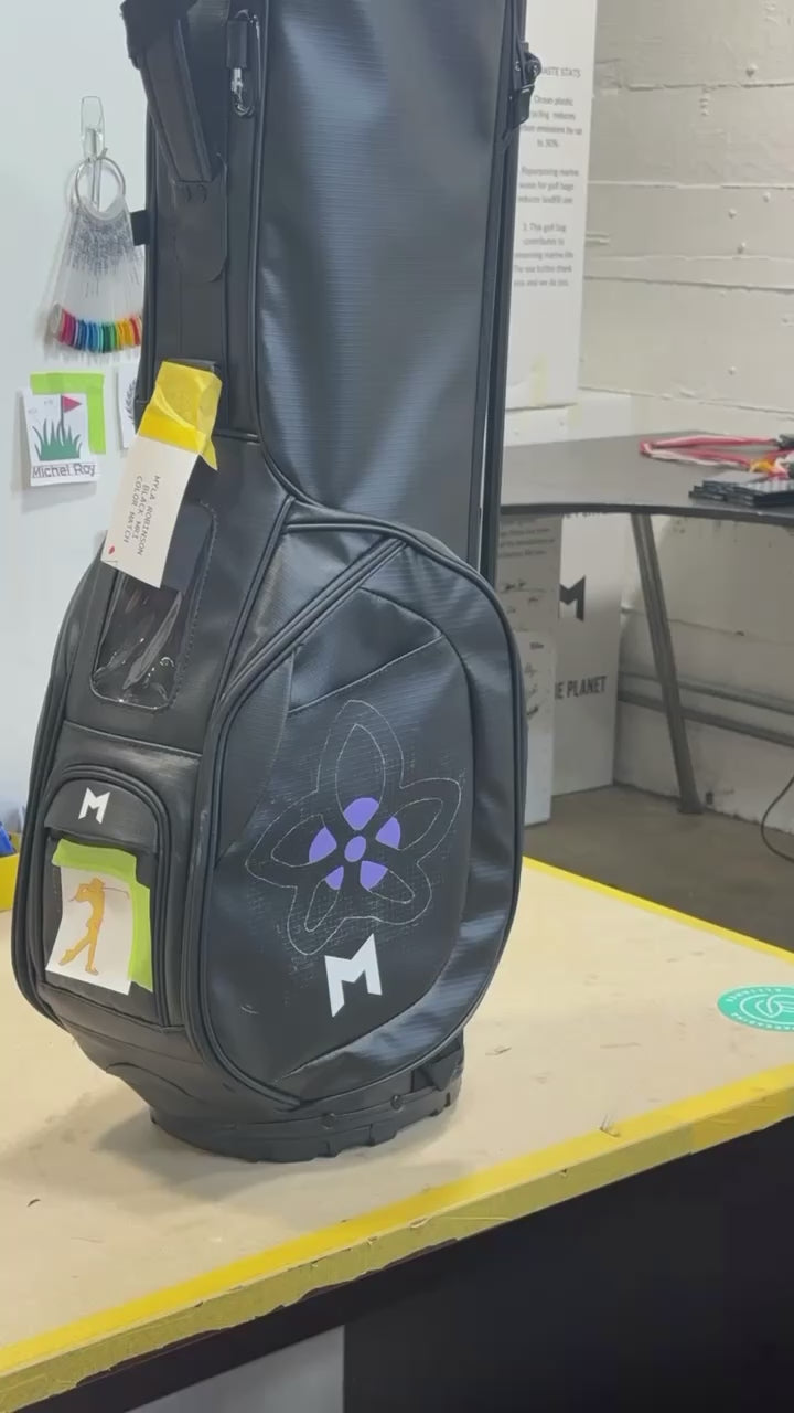 Timelapse of professional artist hand painting custom black golf bag