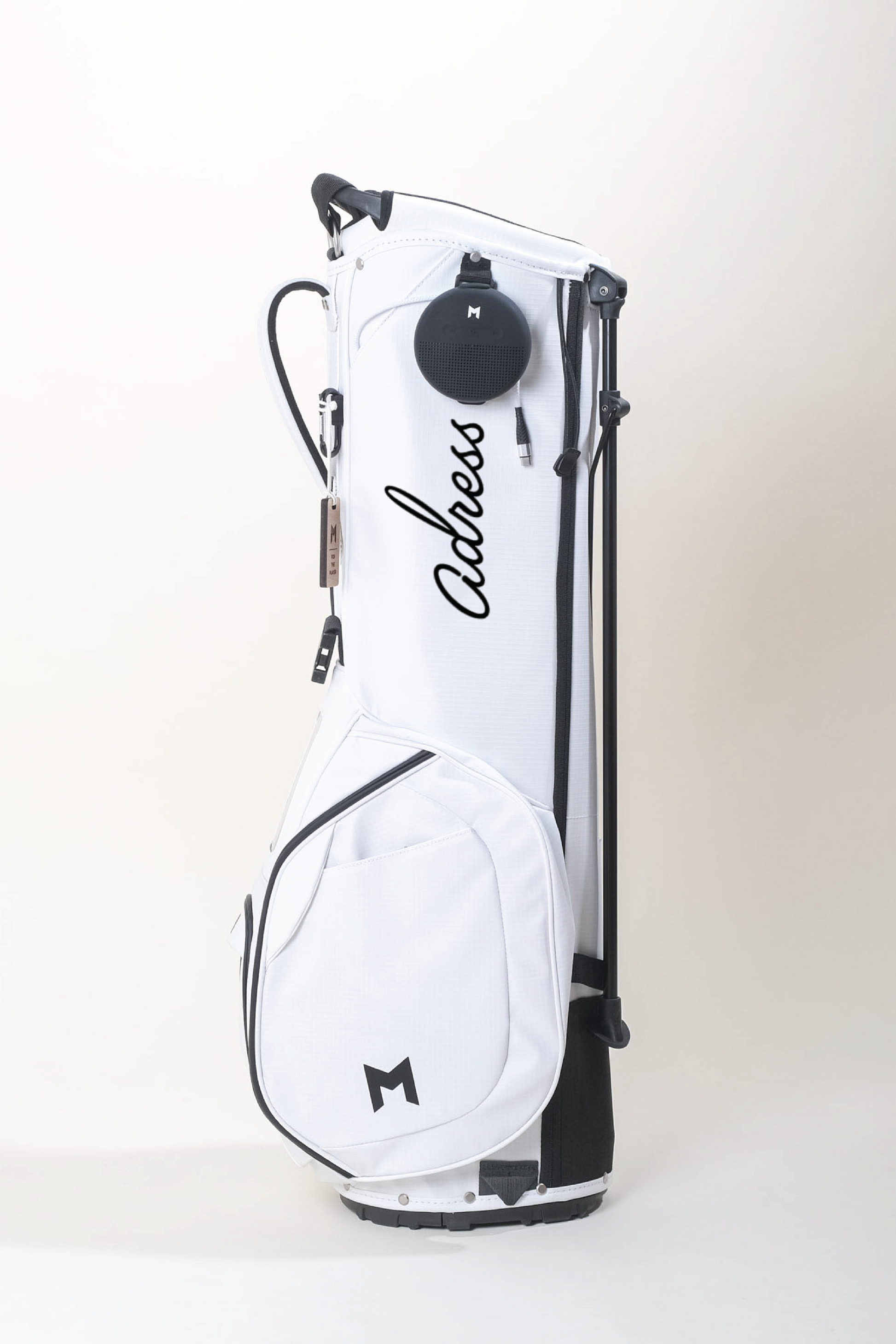 MNML GOLF collaborated with Adress golf company. The white MR1 features the Adress golf logo in contrasting black paint on bright white  recycled ripstop.