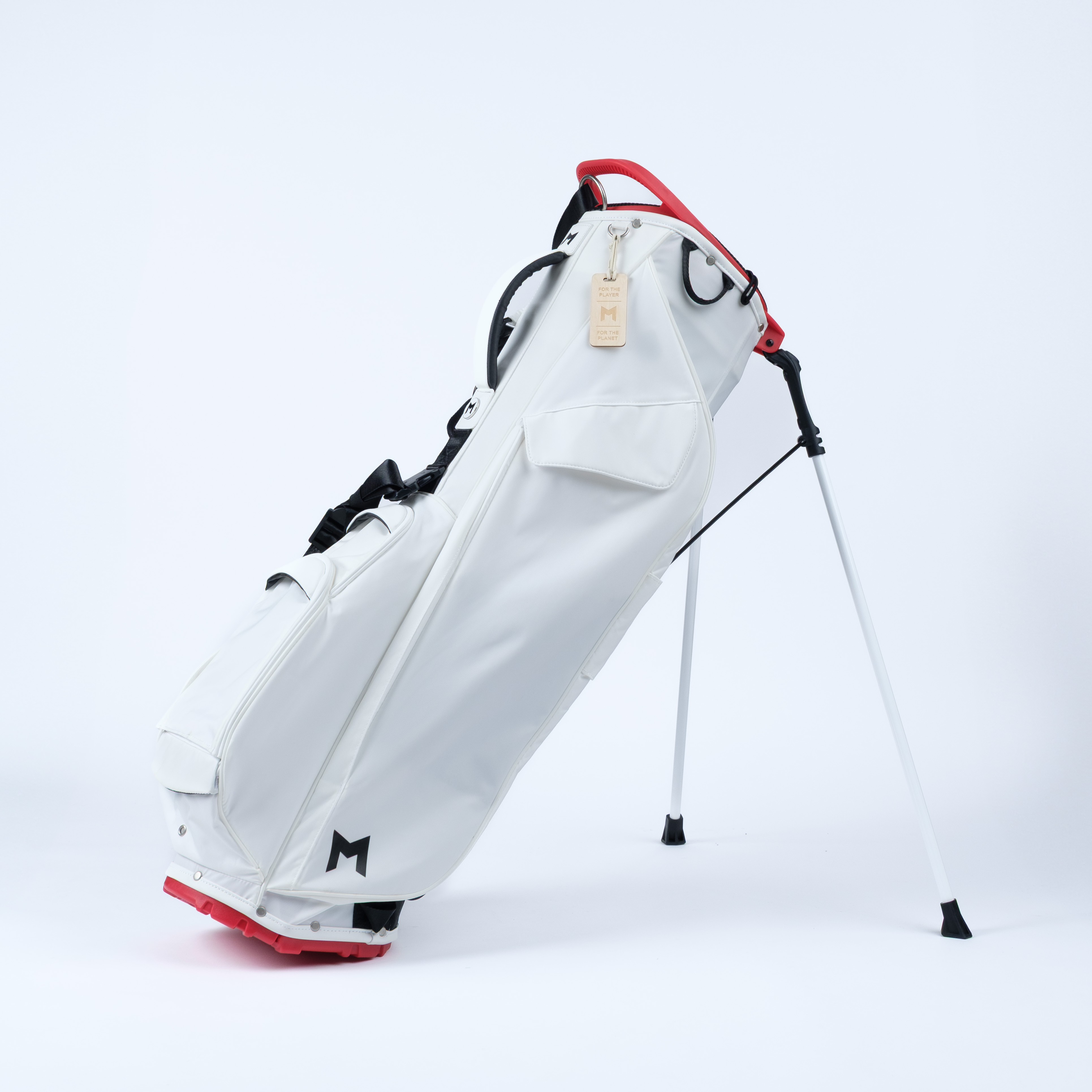 White golf bag with red accents on a white background