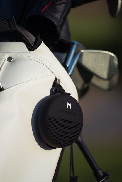 This is a close up of the MNML GOLF waterproof bluetooth speaker.