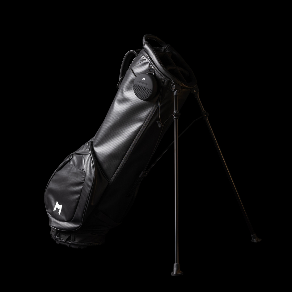 MNML GOLF black sustainable golf bag with recycled material and waterproof bluetooth speaker. 
