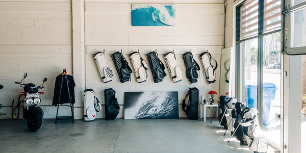 MNML GOLF black golf bag white golf bag at MNML GOLF shop.