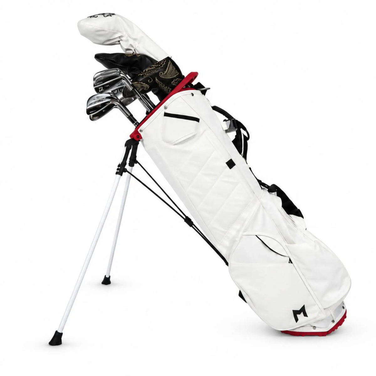 A white stand golf bag with black and red accents, holding a set of golf clubs, photographed on a clean white background.