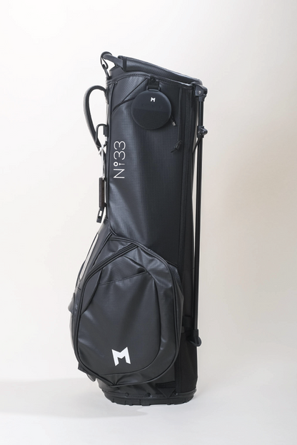 The MNML GOLF and The Number Thirty Three collaboration features the No33 golf logo.