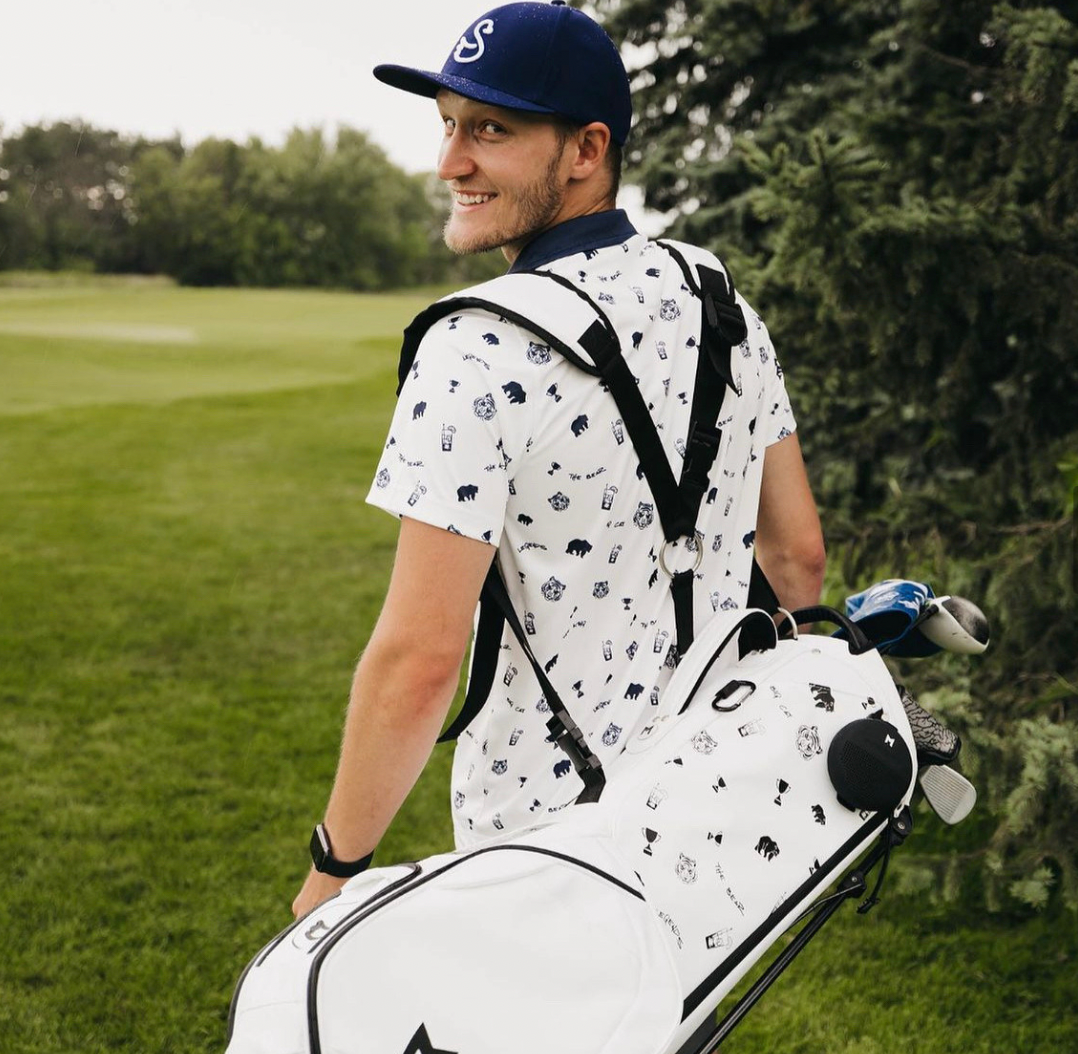 MNML GOLF did a collaboration with Swannies golf company, featuring an all over print from their latest collection. Available in white with contrasting black print.