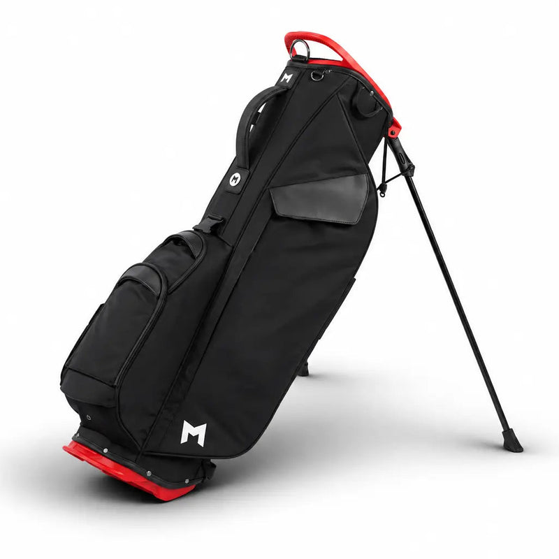 A black stand golf bag with red accents and a black stand leg, shown on a clean white background.