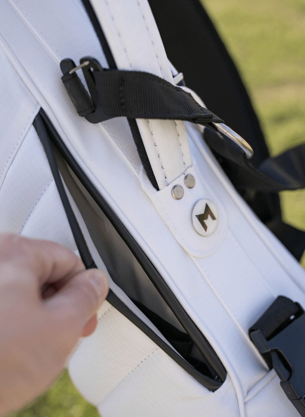 The mnml golf mr1 custom golf bag comes with a low-profile pocket for your rain cover