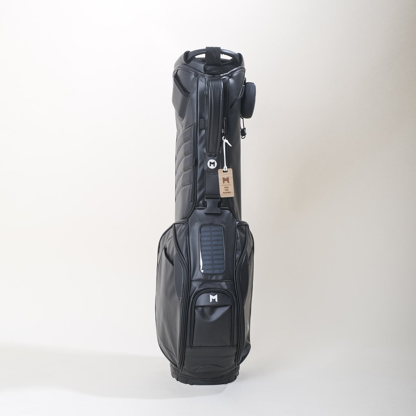 Black golf bag by MNML GOLF with a new top handle, spine handle and made from 100% recycled material.