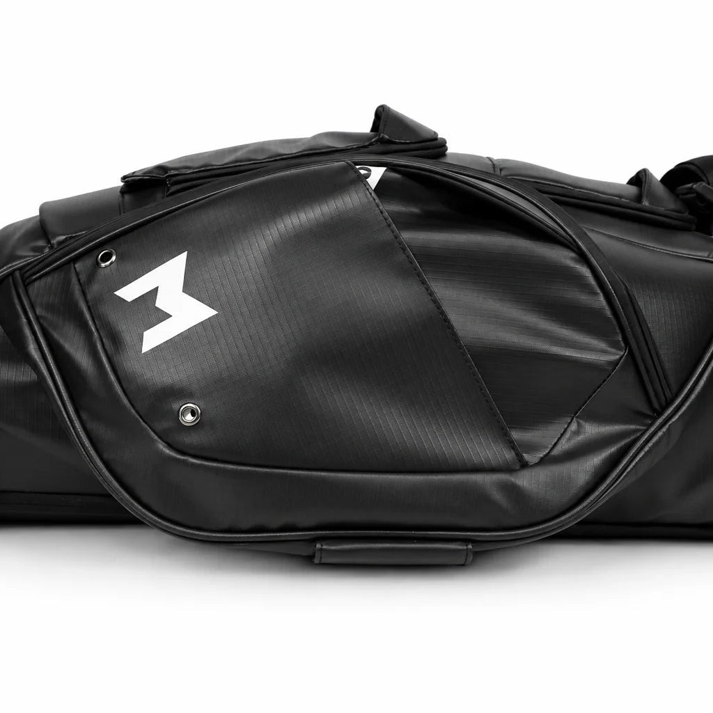 A black recycled golf bag with a prominent white stylized logo on the front pocket, shown in a side profile against a clean white background.
