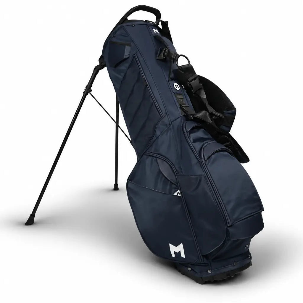 A dark navy blue stand golf bag with black straps and a white logo on the lower front pocket, shown on a clean white background.